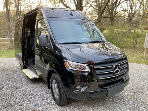 CE4 with the side door open, parked on grass